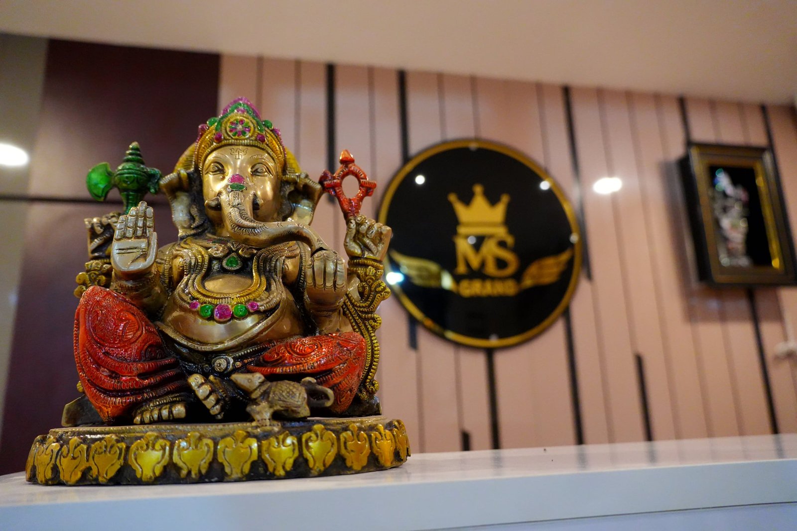 A brass Ganesh idol at the MS Grand reception